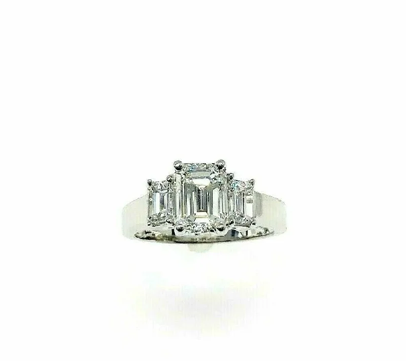 2.54 Carats t.w. 3 Stone Emerald Cut Diamond Wedding Ring GIA 1.64 G VVS2 Center