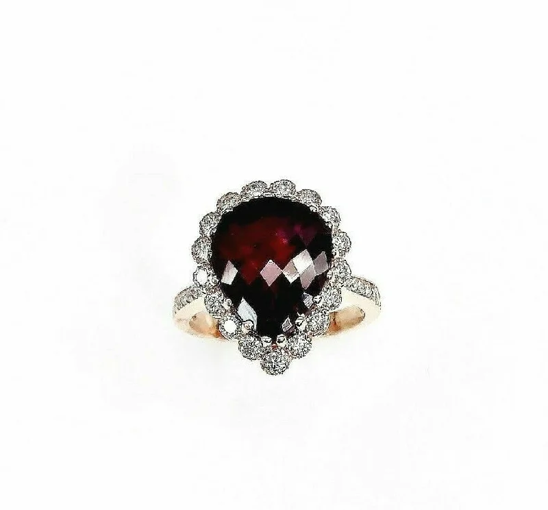 6.49 Carats t.w. Diamond and Ruby Halo Ring Ruby is 5.48 Carats 14K Rose Gold